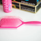 Pink paddle brush